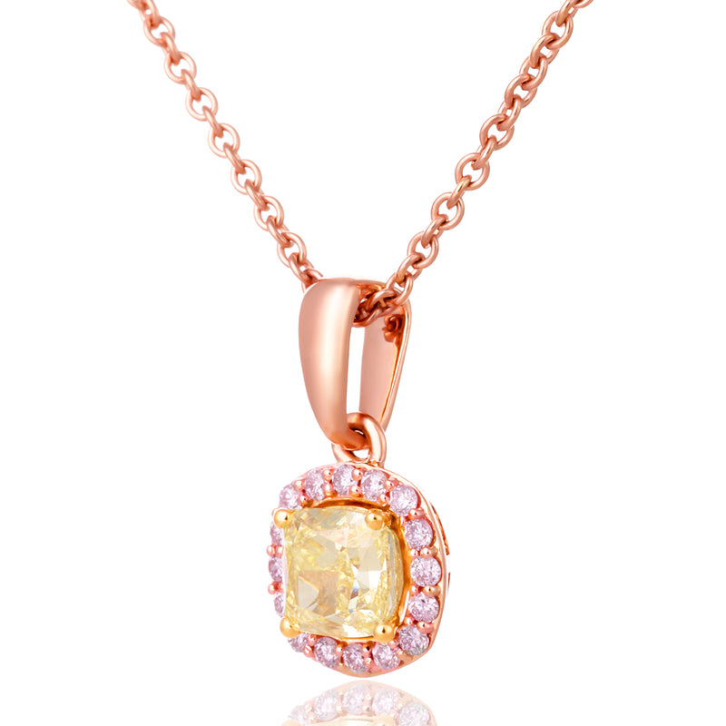 Rose gold pendant necklace featuring a cushion-cut yellow gemstone surrounded by a halo of small pink stones, suspended on a delicate rose gold chain against a white background.