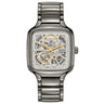 Polished grey ceramic Rado True Square automatic with open-heart dial, gold gears, and sparkling diamond markers.