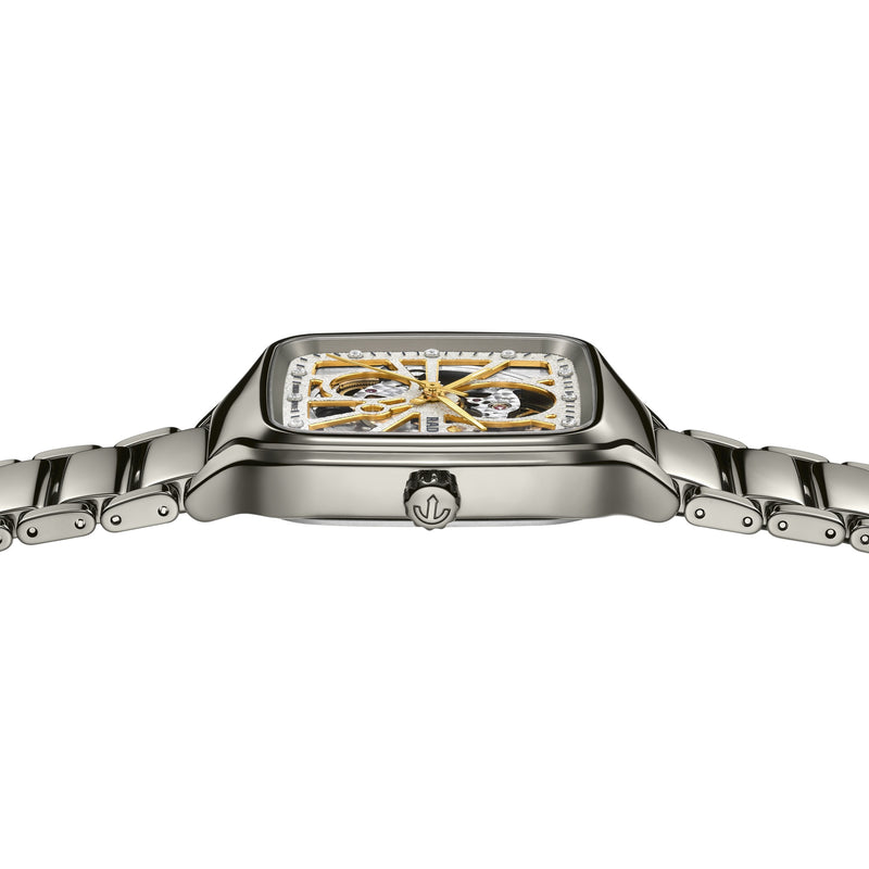Polished grey Rado True Square automatic watch. Titanium bracelet, sparkling open heart dial, gold gears, and diamond markers.