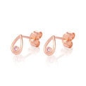 A pair of rose gold teardrop-shaped stud earrings with a small round pink gemstone, shown on a reflective white background.