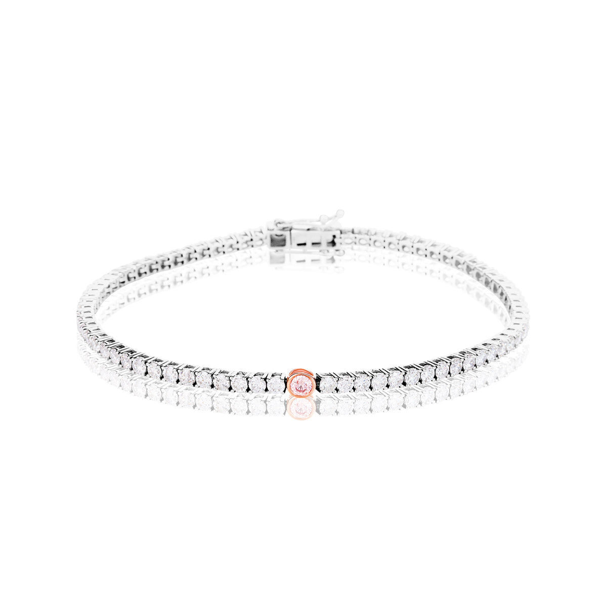 A tennis bracelet featuring a single rose gold oval center stone, displayed on a clean white background with a soft reflection.