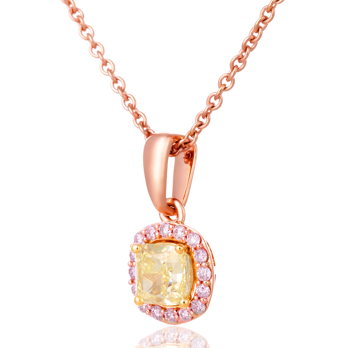 Rose gold pendant necklace featuring a cushion-cut yellow gemstone surrounded by a halo of small pink stones, suspended on a delicate rose gold chain against a white background.
