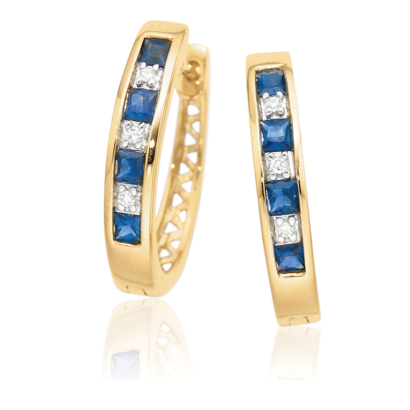 9ct yellow gold huggie earrings, channel set with alternating square-cut blue sapphires & square diamonds.