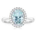 18ct White Gold Oval Cut Aquamarine with 0.15 CARAT tw of Diamonds Ring